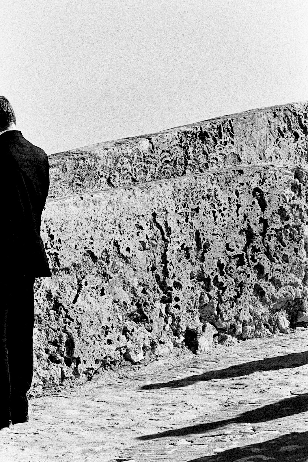 Untitled (suit and shadows), silver gelatin photograph by Mikael Siirilä