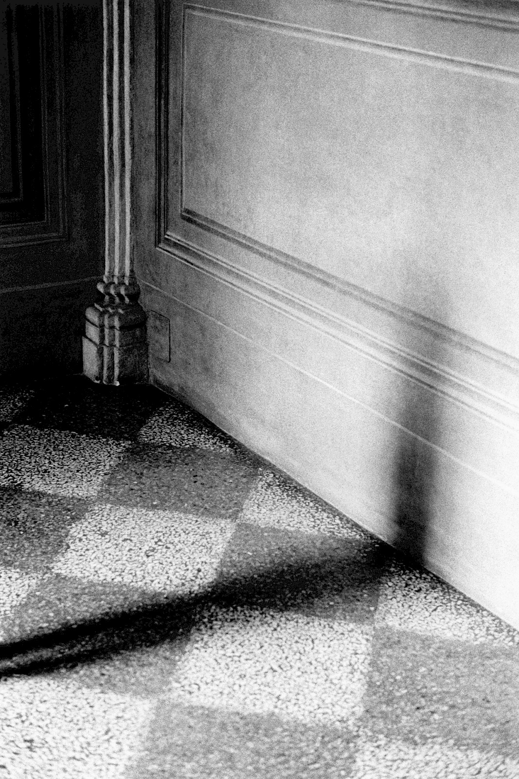 Untitled (corner and shadow), silver gelatin photograph by Mikael Siirilä